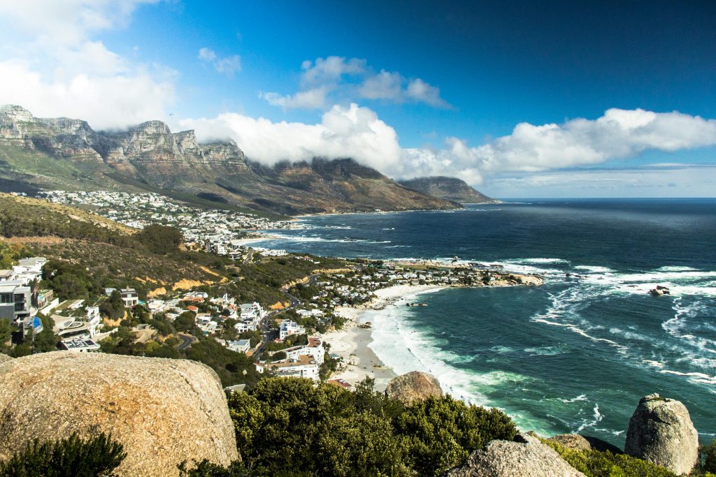 Breathtaking view of Cape Town's coastline with ocean, mountains, and beaches.